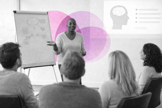 Formatrice animant un échange autour d’un schéma clinique, avec un groupe de professionnels, illustration des principes relationnels de la TLMR avec touches rose et violet Mimethys